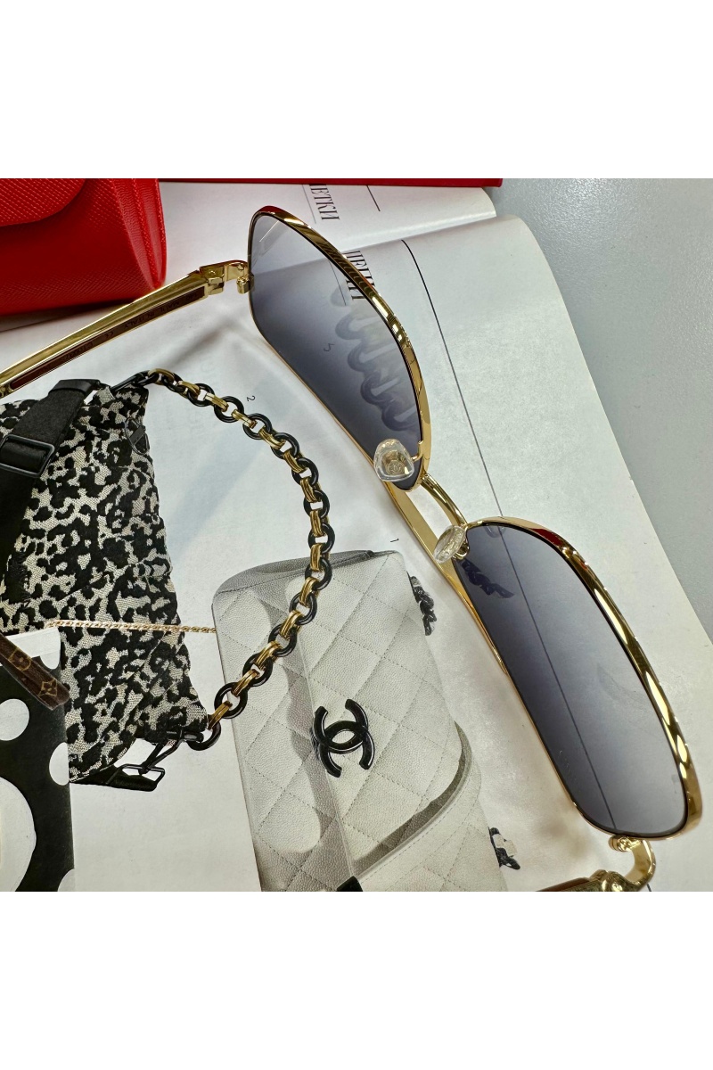 Cartier Солнцезащитные очки с золотой оправой
