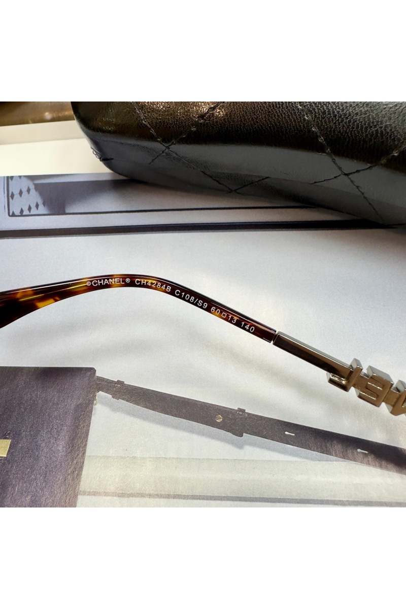 Chаnеl Солнцезащитные очки авиаторы с коричневыми стеклами в серебряной оправе