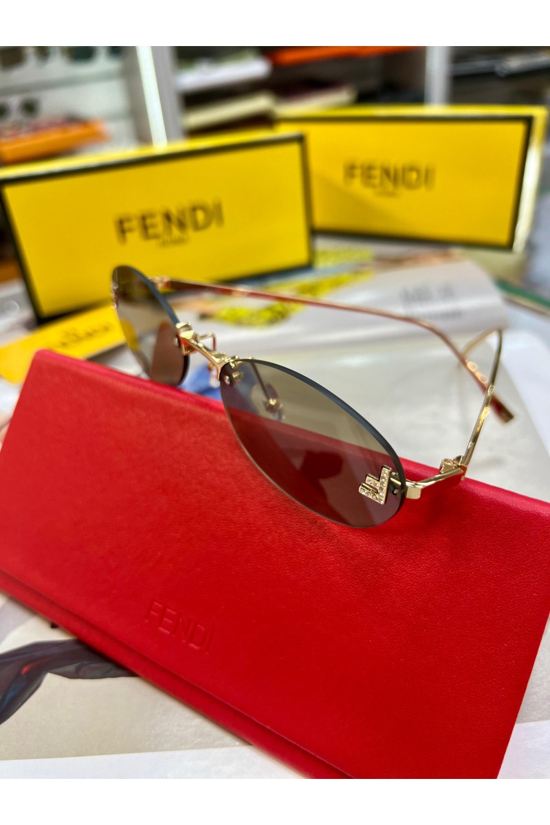 Fendi Коричневые солнцезащитные очки 