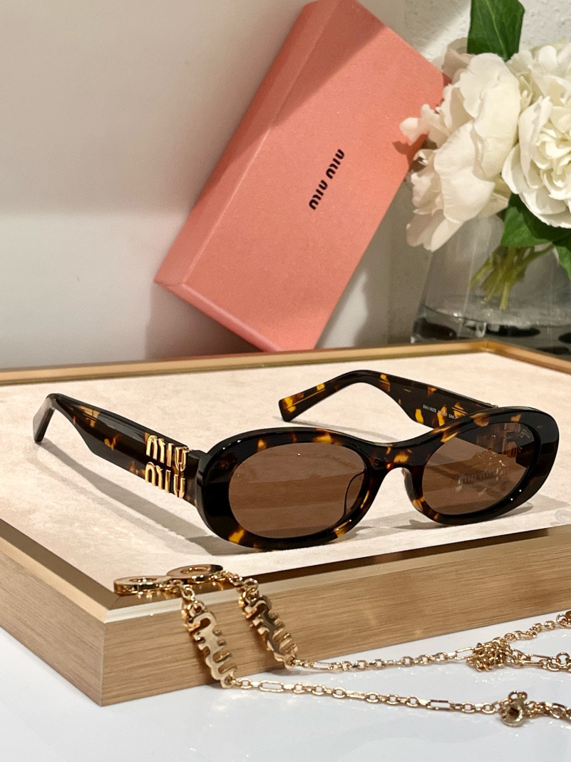 MIU MIU Женские солнцезащитные очки с леопардовой оправой