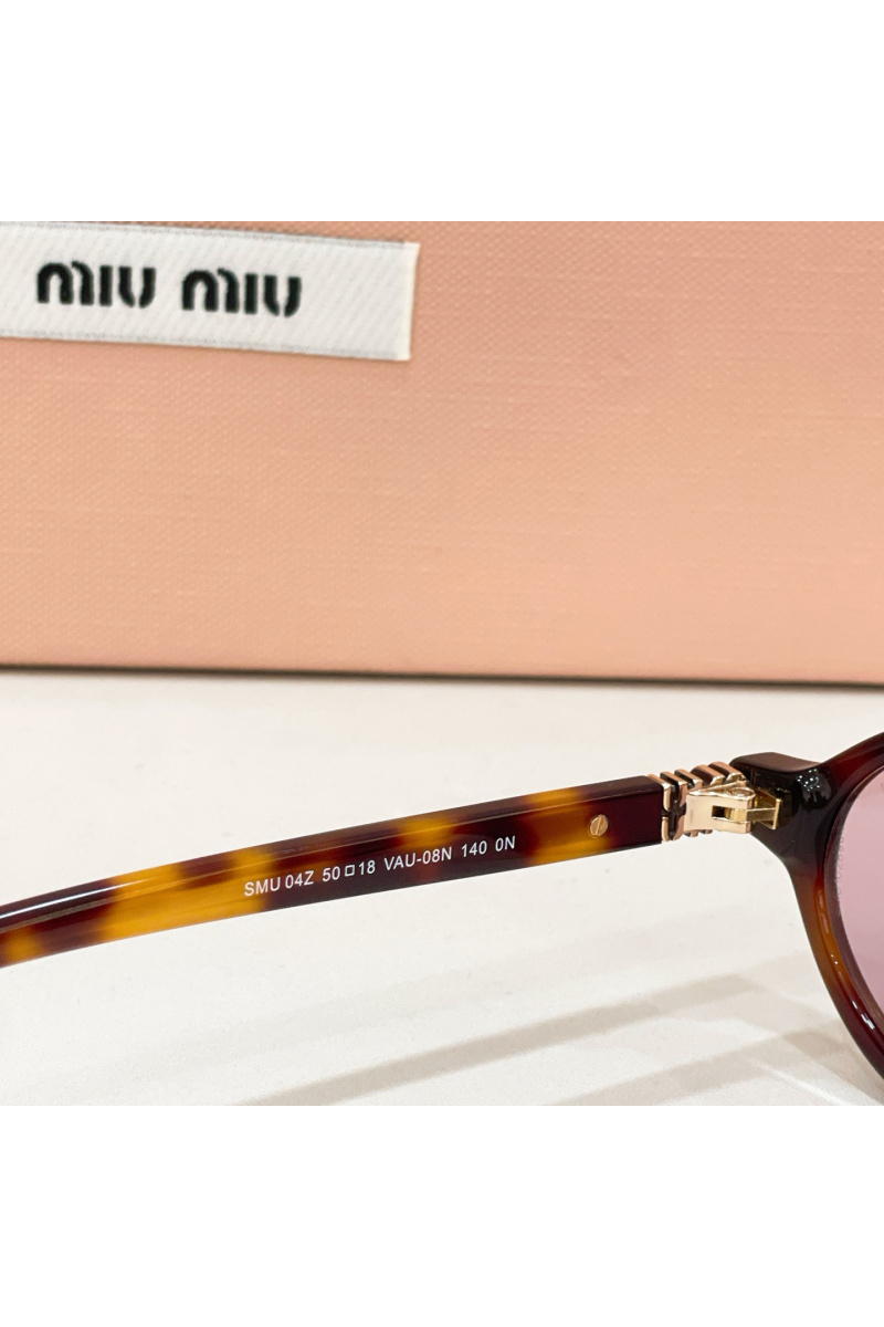 MIU MIU Солнцезащитные очки с леопардовой оправой