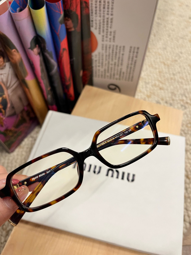 MIU MIU Женские очки с леопардовой оправой