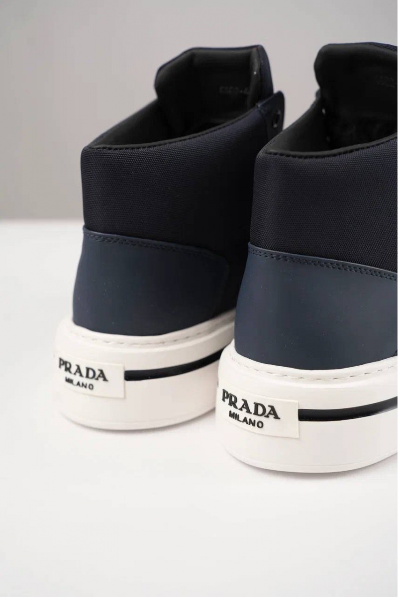 Prada Комбинированные кроссовки с мехом 
