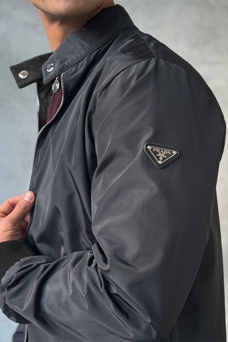 Prada Двусторонняя ветровка logo-plaque - Black / Grey