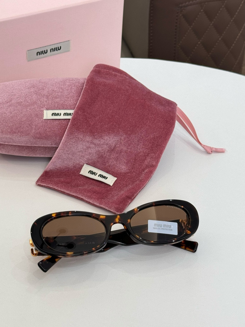 MIU MIU Женские солнцезащитные очки с леопардовой оправой
