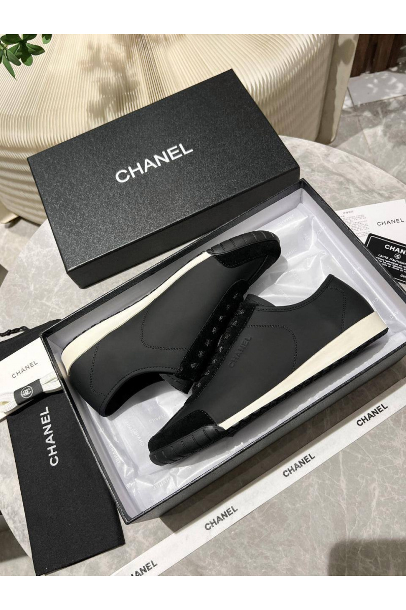 Chаnеl Женские кожаные кроссовки чёрного цвета