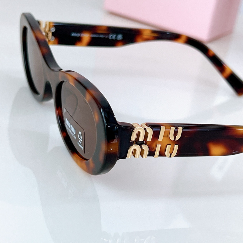 MIU MIU Женские солнцезащитные очки с леопардовой оправой