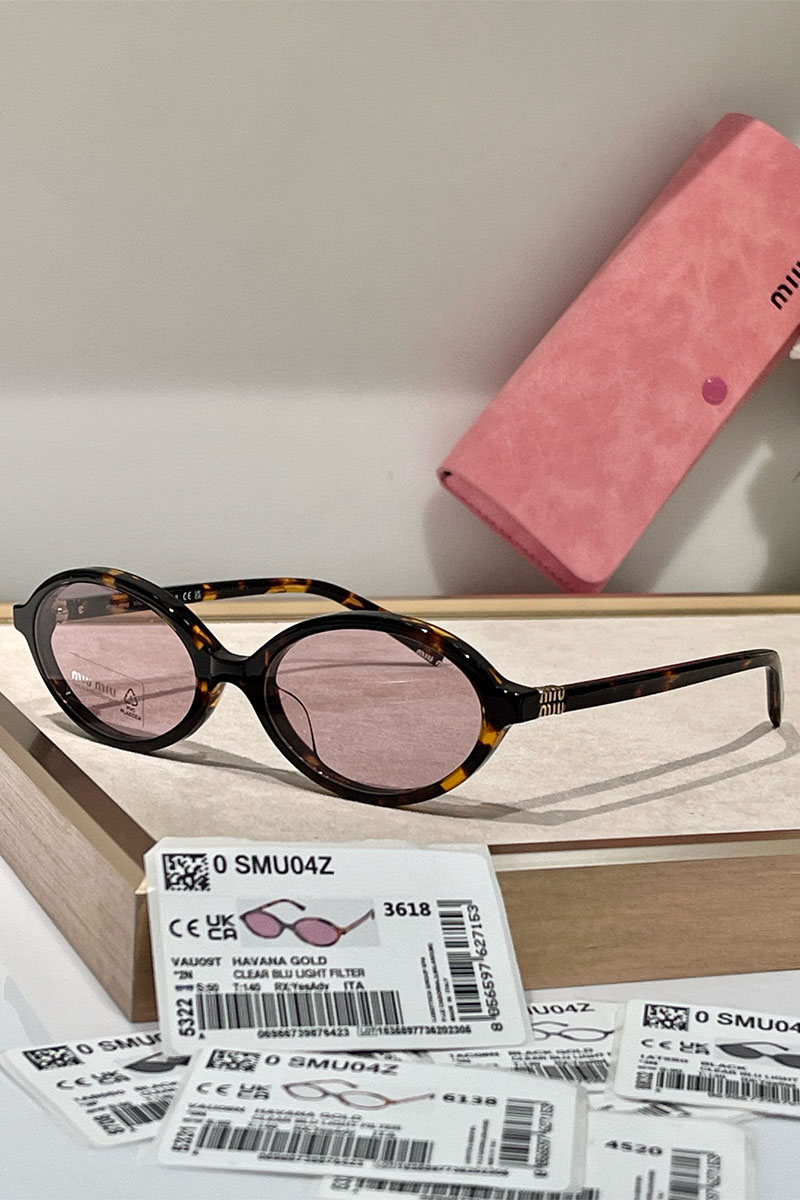 MIU MIU Солнцезащитные очки с леопардовой оправой