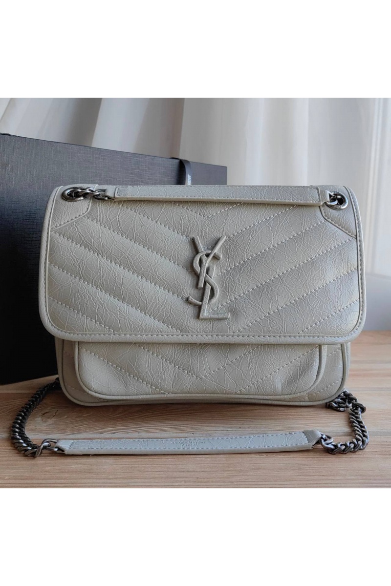 Yves Saint Laurent Кожаная сумка  Niki Medium Blanc Vintage 28x21 см