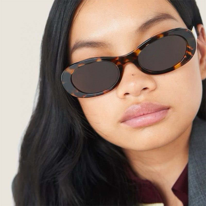 MIU MIU Женские солнцезащитные очки с леопардовой оправой