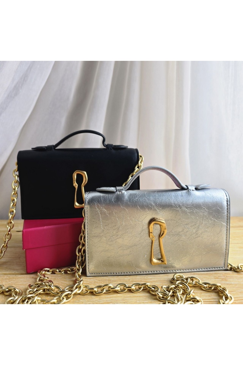 Schiaparelli Кожаная сумка клатч 19x11 см